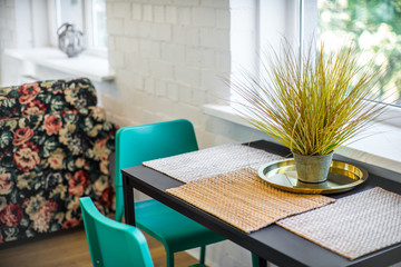 The kitchen and dining room in a modern apartment. Kitchen area in studio apartments. © Aleks Kend
