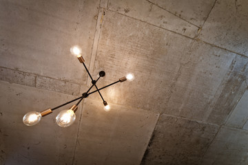 Concrete ceiling and lighting in a modern apartment. Concrete style in the apartment. © Aleks Kend