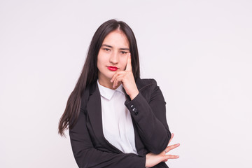 Fototapeta premium Successful business woman in a jacket on a white background