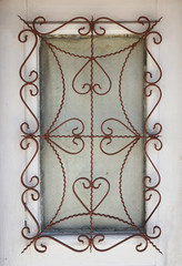 Window with styled iron grid