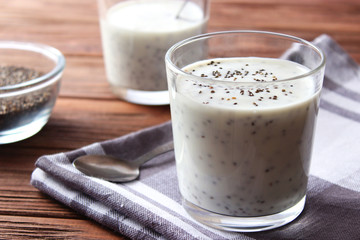 chia pudding with yogurt on a wooden background. A simple recipe for proper nutrition, useful...