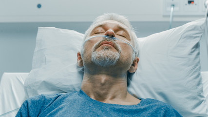 In the Hospital, Close-up Shot of Senior Patient Lying in Bed, Sleeping. Modern Hospital Geriatrics...