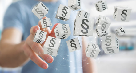 Businessman using 3D rendering law cubes