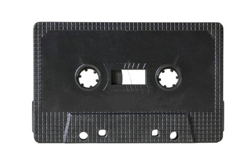 A vintage empty cassette tape from the 1980's. Colors: fine black, no label.
