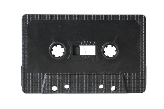 A vintage empty cassette tape from the 1980's. Colors: fine black, no label.
 - Powered by Adobe