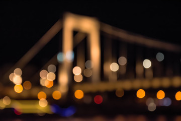 The silhouette of the bridge out of focus