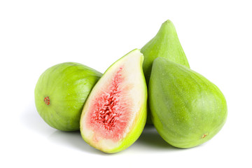 Ripe green fig fruit and half isolated on white background