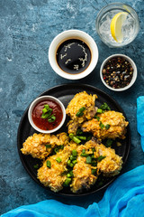 Chicken wings in breading. Deep fried chicken wing. American food. Top view
