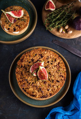 Tarte on sand base with fresh figs, almonds and crispy waffle with almonds and cocoa powder. Fresh Homemade Fruit Tart with berries