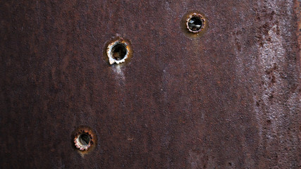 Bullet Hole in Metal