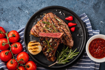 Steak beef. Beef steak medium with red pepper, aromatic herbs and fried onion