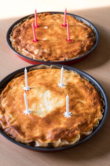 Homemade pie with birthday candles