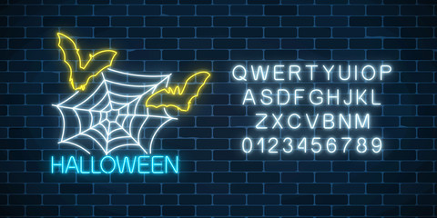 Glowing neon sign of halloween banner design with spidrer web, bats and alphabet. Bright halloween night scary sign