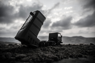 War concept. Battle scene with rocket launcher aimed at gloomy sky at sunset time. Rocket vehicle...