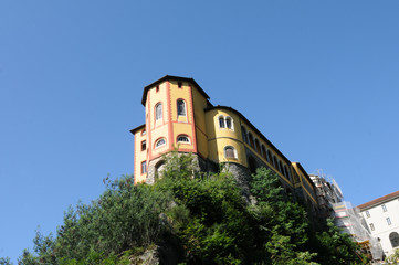 Fototapeta na wymiar The Monastry Santa Caterina del Sasso on Mount Carcada above Lake Maggiore