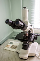 Microscope. Real medical equipment for blood analysis.