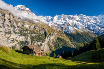 Fototapeta na wymiar Spectacular mountain views near the town of Murren (Berner Oberland, Switzerland). Murren is a traditional mountain village on 1,650 m and is unreachable by public road.