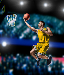 basketball player making slam dunk on basketball arena