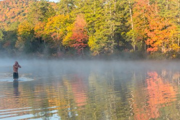 Cold morning swim in Autumn - New Hampshire