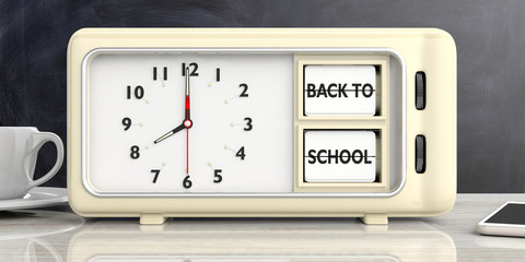 Back to school text on an old retro alarm clock, office desk background. 3d illustration