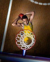 basketball player making slam dunk on basketball arena © 27mistral