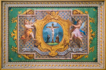 Fototapeta na wymiar Crucifixion of Jesus with cupids fresco in the Church of the Suore Missionarie di Gesù Eterno Sacerdote, in Rome, Italy.