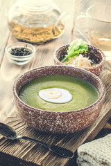 Puree cream soup of green leaf lettuce, spinach and cheese