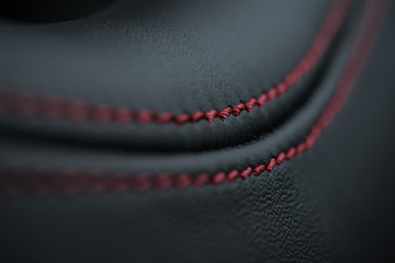 Detailed image of a car leather pleats stitch work.