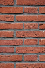 Fototapeta premium Dark red Brick wall for background or texture. Old red brick wall texture background