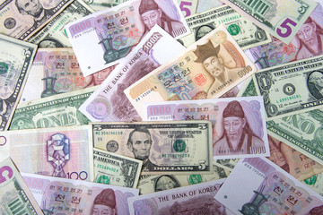 Flat lay Korean and American money small denominations. 