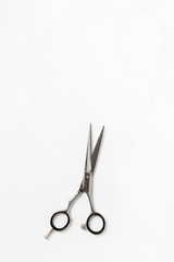 Professional hair dresser tools on white background with copy space