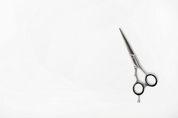 Professional hair dresser tools on white background with copy space