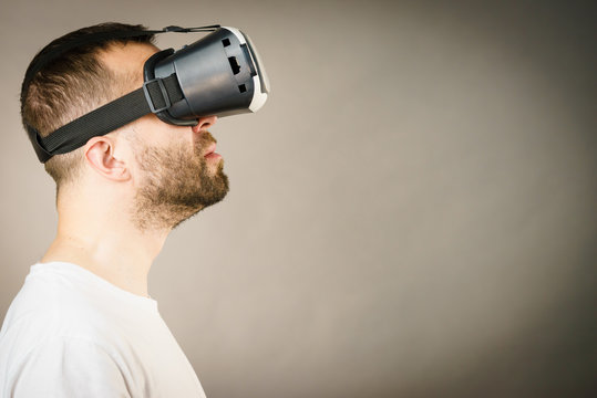 Adult man wearing vr goggles