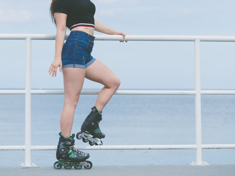 Sexy woman wearing roller skates