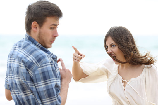 Crazy girlfriend scolding her boyfriend