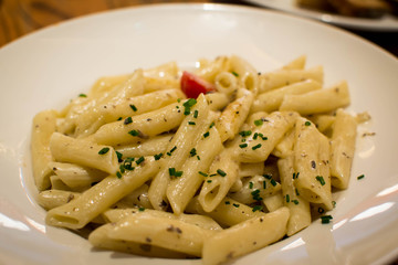 Penne pasta with truffle sauce