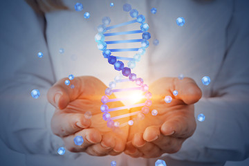 Woman holding dna helix hologram