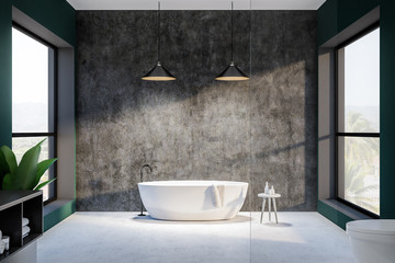 Fototapeta na wymiar Green and concrete bathroom interior, round tub