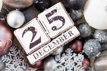 Christmas decorations and wooden blocks with 25 December Date