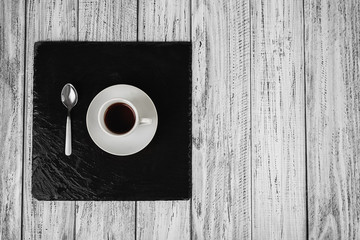 cup of coffee and teaspoon