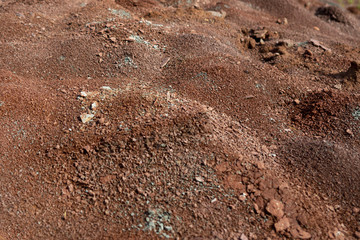 Red earth or soil background. Tropical laterite soil  background of red clay. Dry Orange surface, Picture of natural disaster. Drought land Caused by global warming and deforestation.