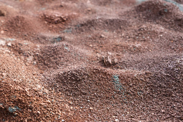 Red earth or soil background. Tropical laterite soil  background of red clay. Dry Orange surface,...