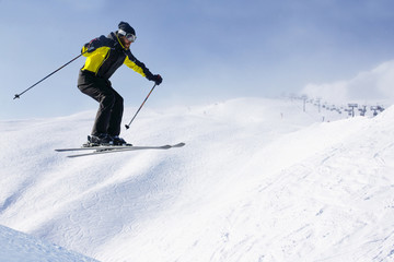 Plakat Jumping skier at mountains