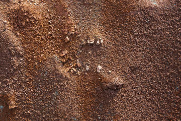 Red earth or soil background. Tropical laterite soil  background of red clay. Dry Orange surface, Picture of natural disaster. Drought land Caused by global warming and deforestation.