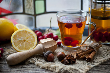Hawthorn and ripe hawthorn fruit, tea with hawthorn and lemon