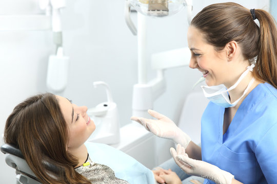 Dentist explaining procedures to a patient