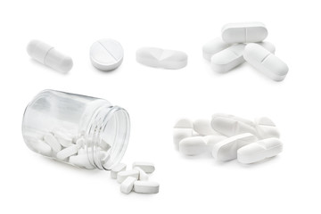 Set with different pills on white background