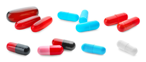 Set with different pills on white background