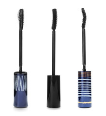 Set with different mascara wands for eyelashes on white background