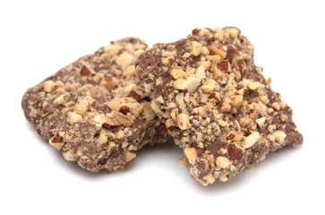 Chocolate Covered English Toffee Coated in Nuts on a White Background